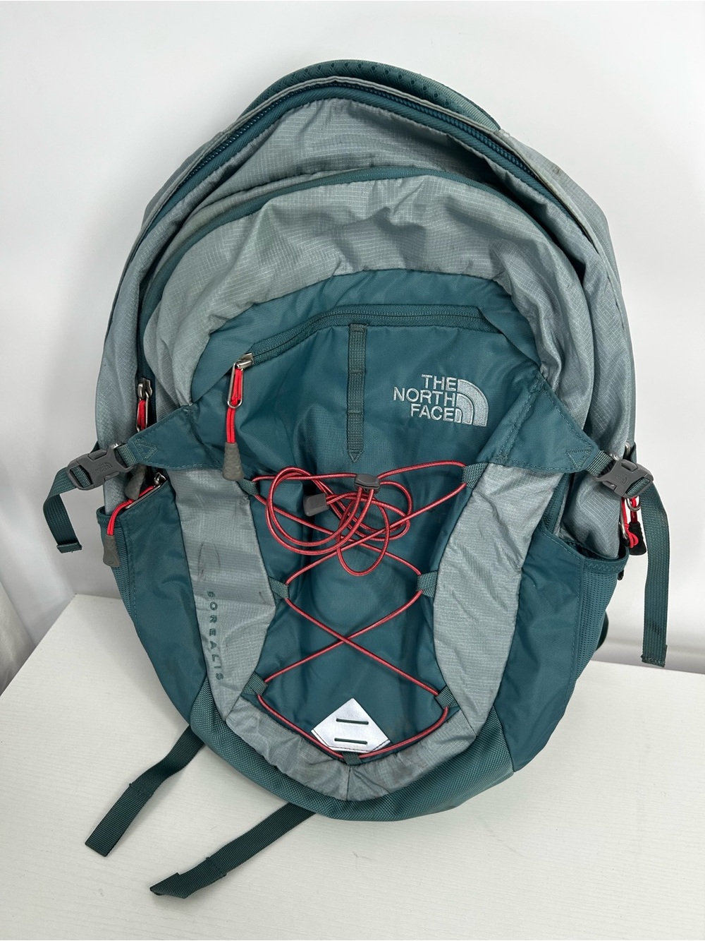 The Northface Women’s Blue Teal Borealis Backpack With Salmon Bungee Detail